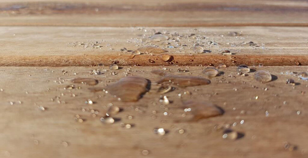 Water repellent surface from shed treatment